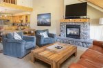 Living Room with a Gas Fireplace and TV